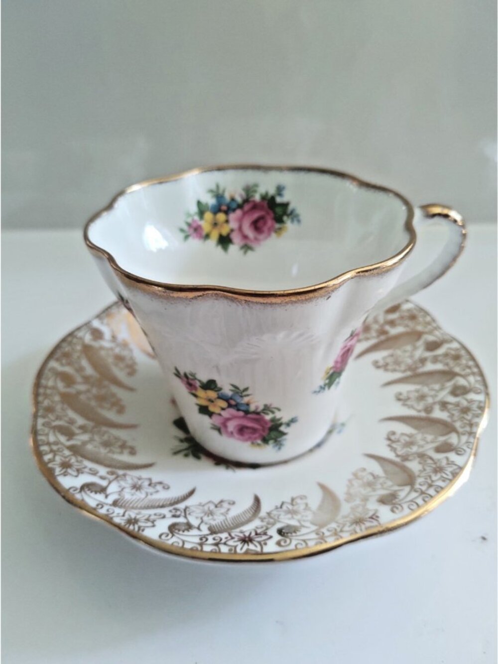 Vintage Sandringham England bone china teacup and saucer set